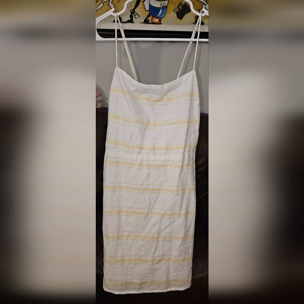Her entire name says Grace yellow and cream dress sz L